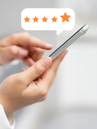 Person holding smart phone leaving a 5 City Finance Bank Google review